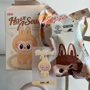 Pop Mart “Have a Seat” Labubu Sisi